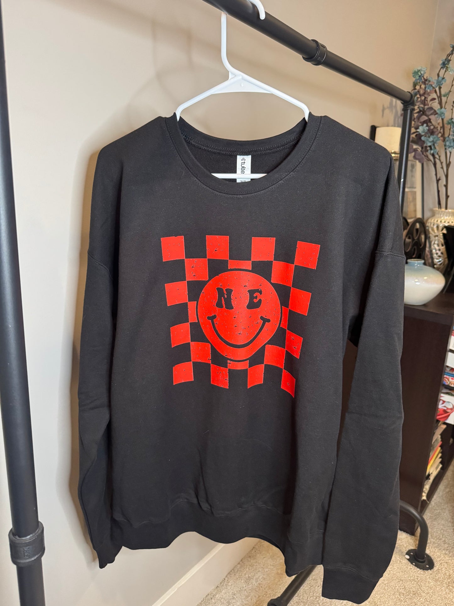 Large black sweatshirt NE checkered