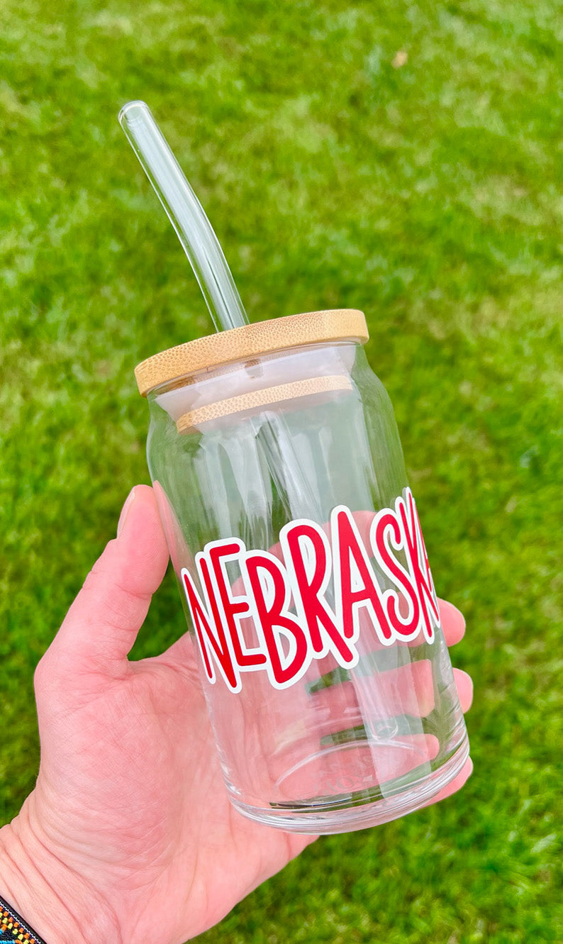 Custom can glass 16oz- Includes a lid and a straw.